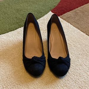 Black suede knotted toe wedge heels. Brand CL by Laundry. Size 7 1/2.